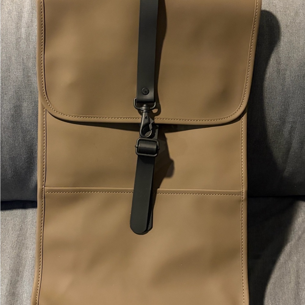 Rains Men's Tan Sling Backpack with Black Strap Waterproof